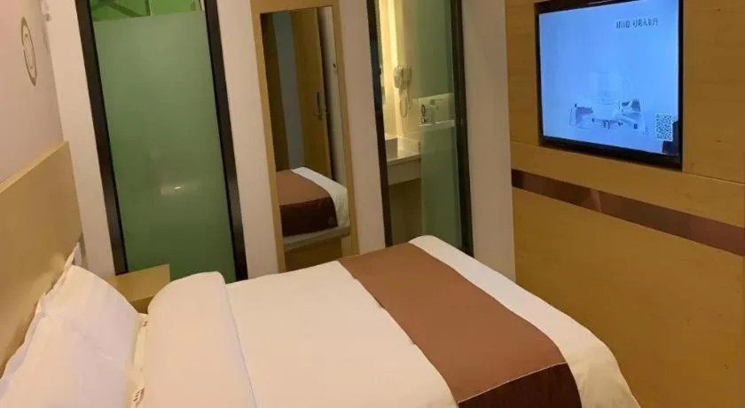 Bed in Shell Hotel Beijing Fangshan District Chengguan Metro Station