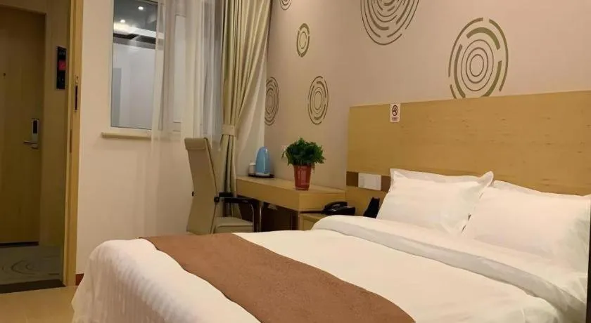 Bed in Shell Hotel Beijing Fangshan District Chengguan Metro Station