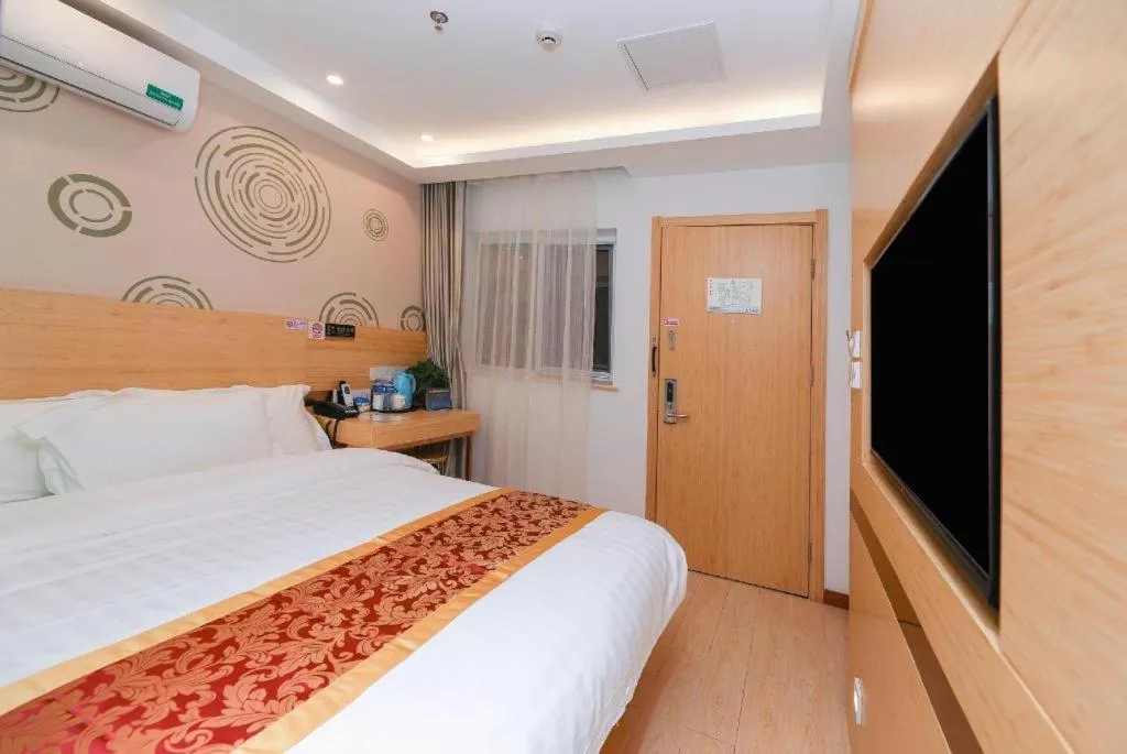 Bed in Shell Hotel Beijing Fangshan District Chengguan Metro Station