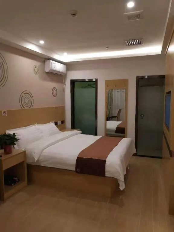 Bed in Shell Hotel Beijing Fangshan District Chengguan Metro Station