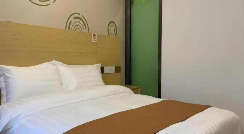 Bed in Shell Hotel Beijing Fangshan District Chengguan Metro Station