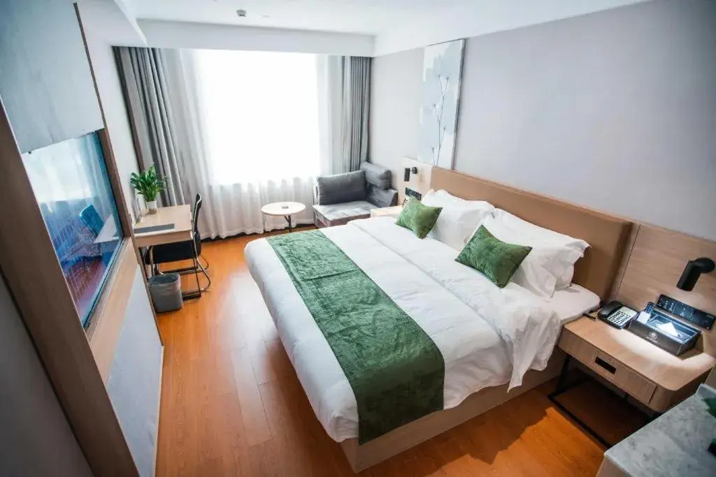 Bed in GreenTree Inn Tangshan Nanhu International Exhibition Center Bed in GreenTree Inn Tangshan Nanhu International Exhibition Center