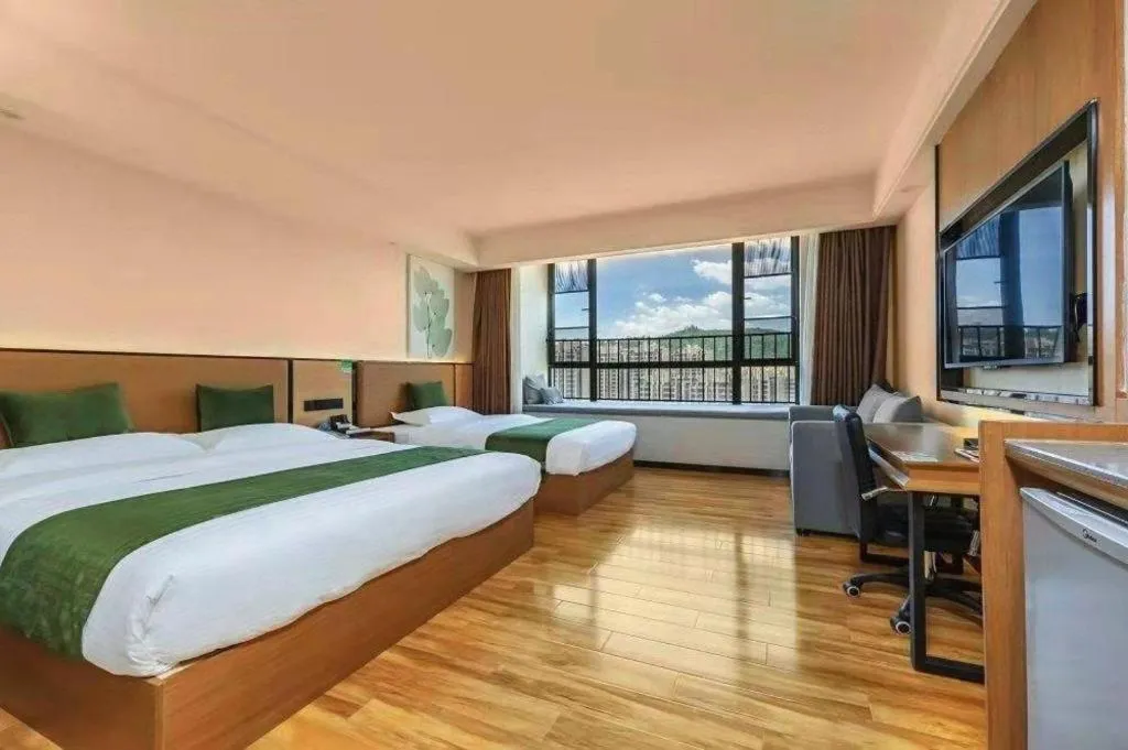 Bed in GreenTree Inn Tangshan Nanhu International Exhibition Center