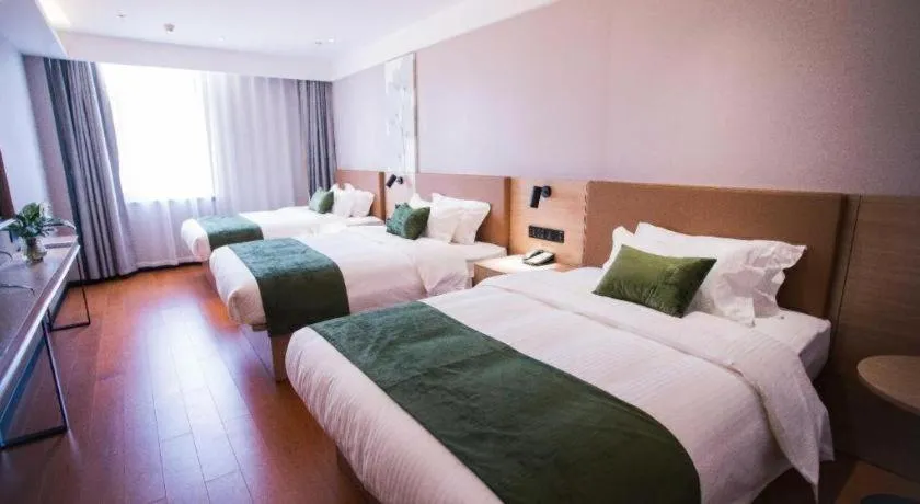 Bed in GreenTree Inn Tangshan Nanhu International Exhibition Center