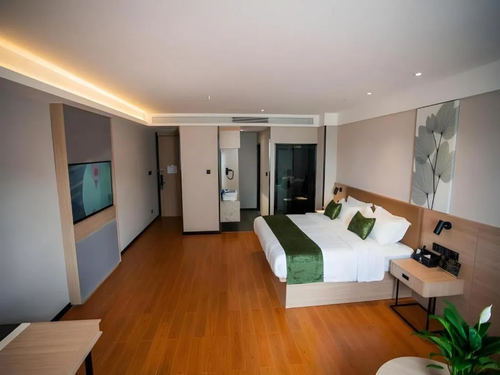 Bed in GreenTree Inn Tangshan Nanhu International Exhibition Center