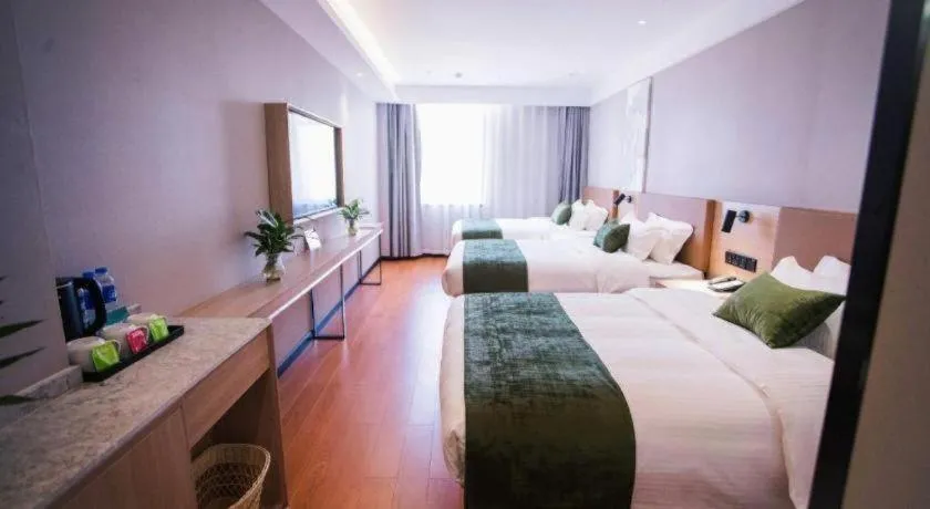 Bed in GreenTree Inn Tangshan Nanhu International Exhibition Center