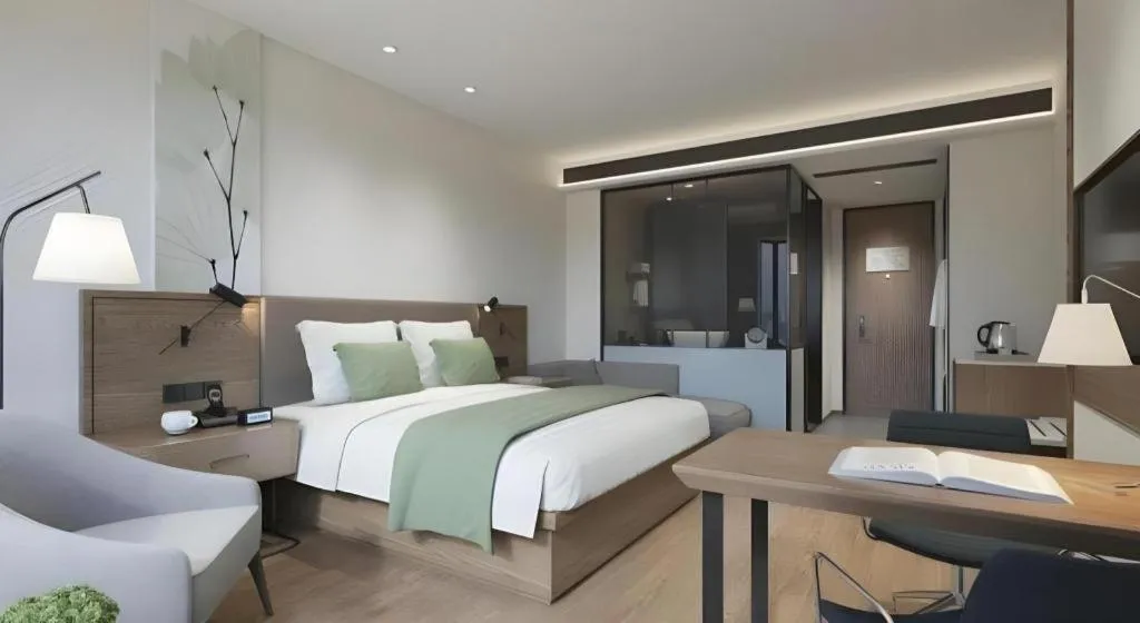 Bed in GreenTree Inn Tangshan Nanhu International Exhibition Center