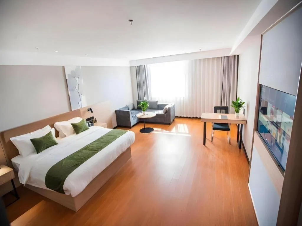 Bed in GreenTree Inn Tangshan Nanhu International Exhibition Center