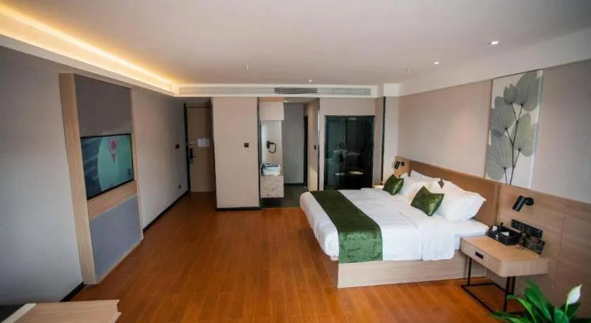 Bed in GreenTree Inn Tangshan Nanhu International Exhibition Center