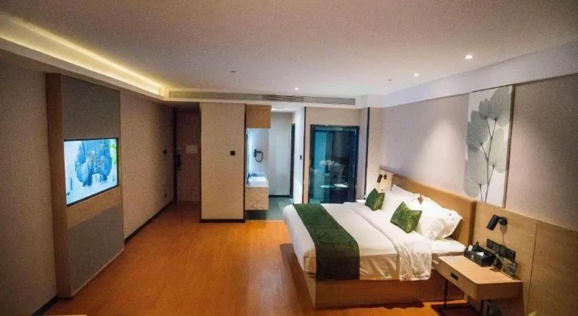 Bed in GreenTree Inn Tangshan Nanhu International Exhibition Center