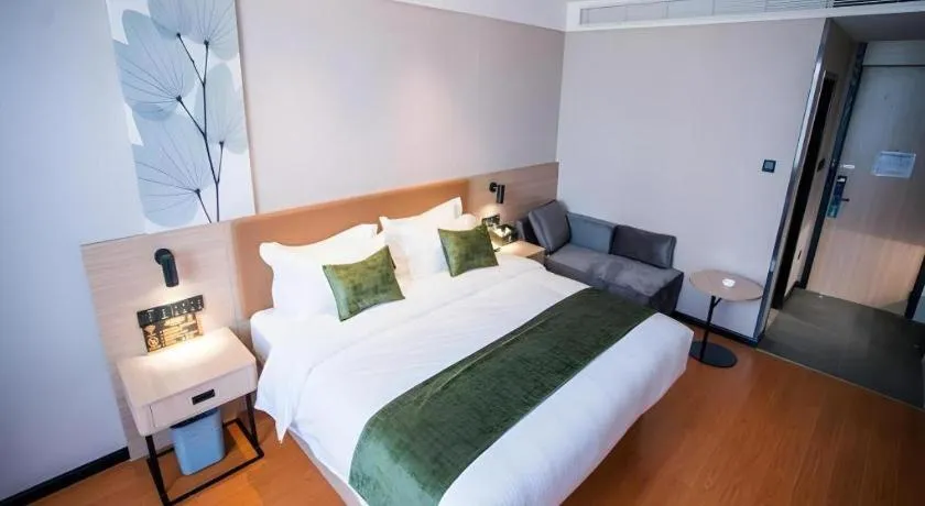 Bed in GreenTree Inn Tangshan Nanhu International Exhibition Center