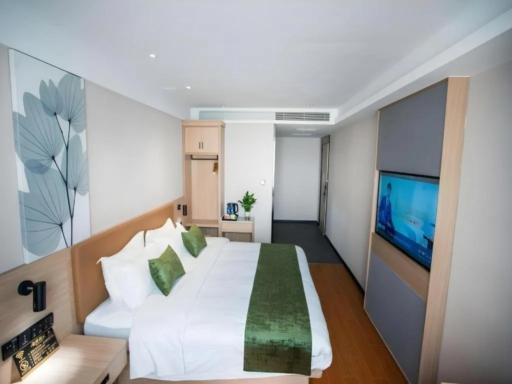 Bed in GreenTree Inn Tangshan Nanhu International Exhibition Center