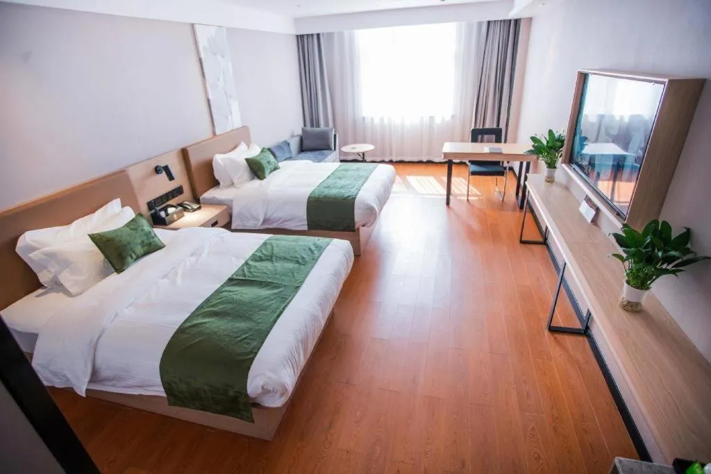 Bed in GreenTree Inn Tangshan Nanhu International Exhibition Center