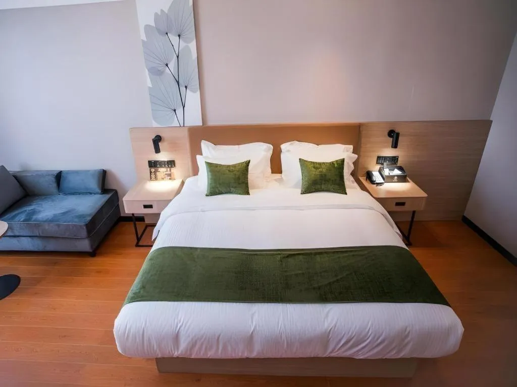 Bed in GreenTree Inn Tangshan Nanhu International Exhibition Center