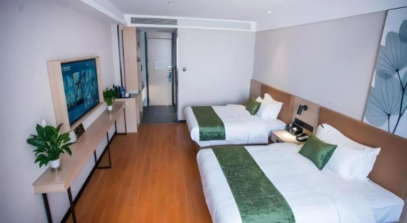 Bed in GreenTree Inn Tangshan Nanhu International Exhibition Center