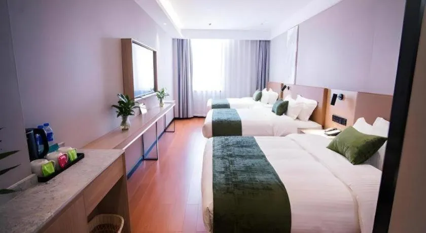 Bed in GreenTree Inn Tangshan Nanhu International Exhibition Center
