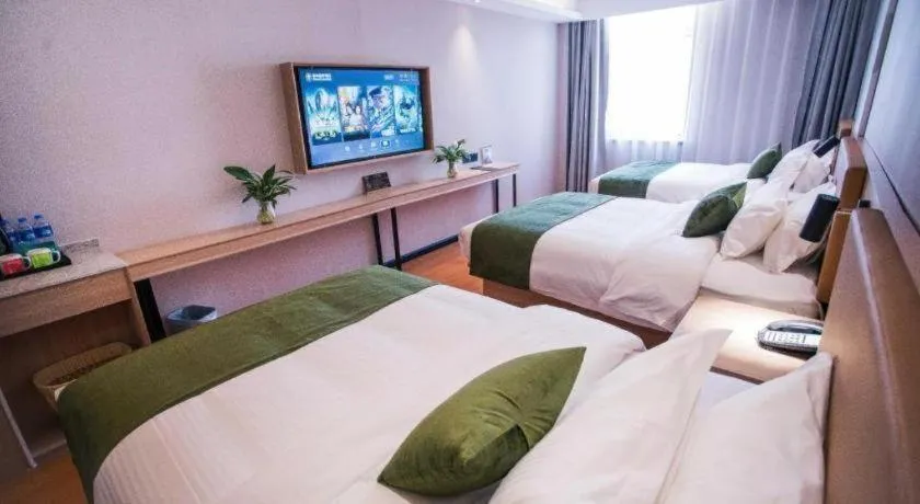 Bed in GreenTree Inn Tangshan Nanhu International Exhibition Center