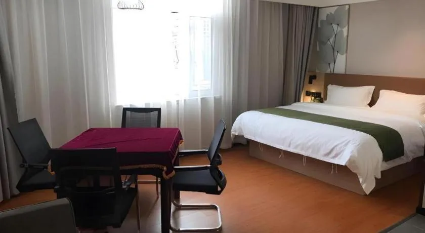 Bed in GreenTree Inn Tangshan Nanhu International Exhibition Center