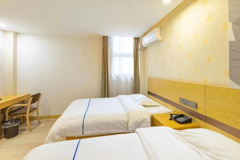 Bed in GreenTree Inn Express Shanghai Baoshan District Youyi Road Metro Station