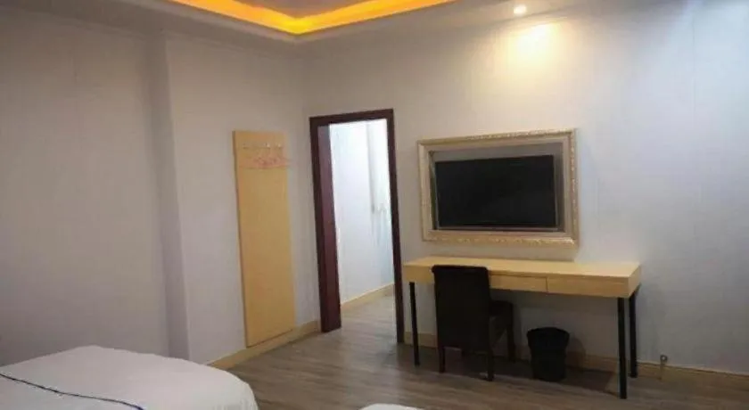 Bed in GreenTree Inn Express Shanghai Baoshan District Youyi Road Metro Station