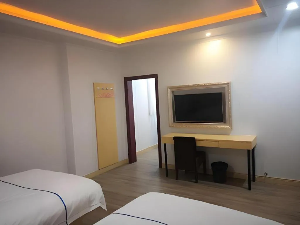 Bed in GreenTree Inn Express Shanghai Baoshan District Youyi Road Metro Station