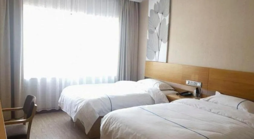 Bed in GreenTree Inn Express Shanghai Baoshan District Youyi Road Metro Station