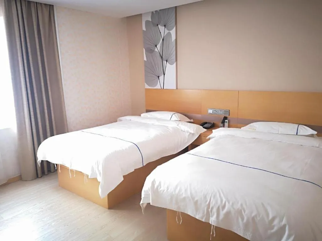 Bed in GreenTree Inn Express Shanghai Baoshan District Youyi Road Metro Station