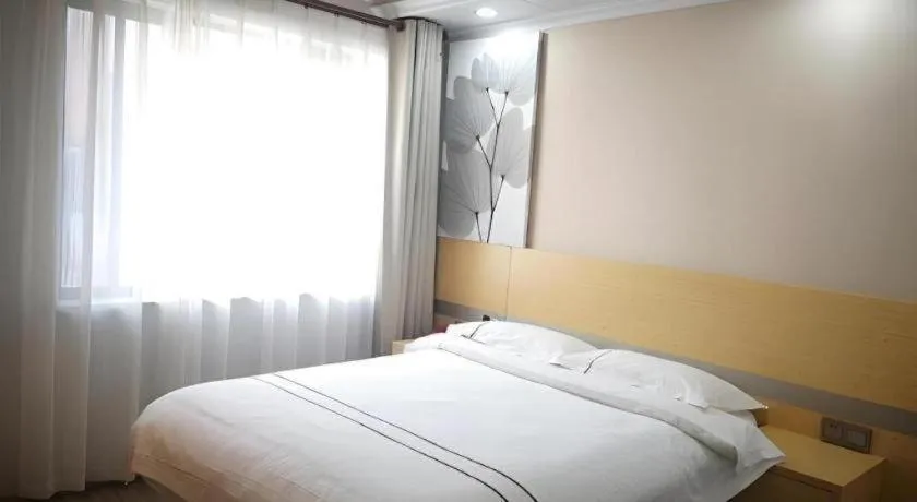 Bed in GreenTree Inn Express Shanghai Baoshan District Youyi Road Metro Station