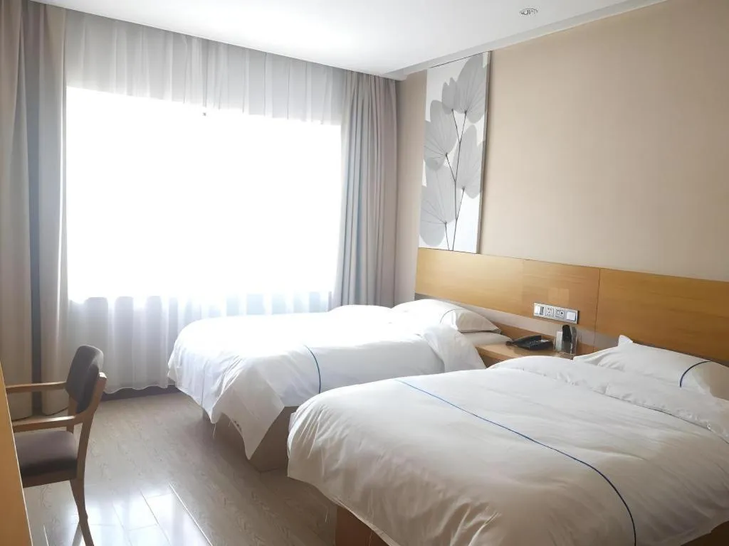 Bed in GreenTree Inn Express Shanghai Baoshan District Youyi Road Metro Station