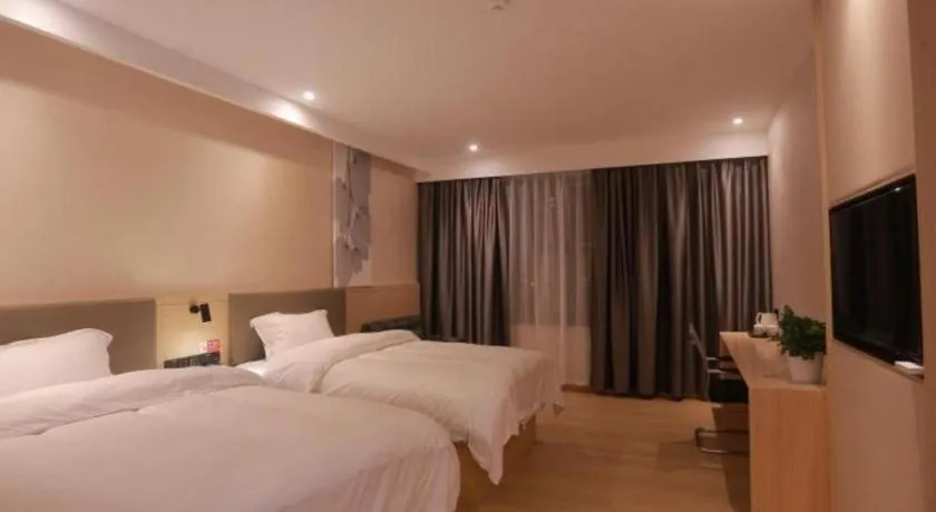 Bed in Shell Hotel Chuzhou Economic Development Zone Internation Shangcheng