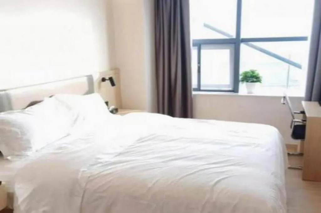 Bed in Shell Hotel Chuzhou Economic Development Zone Internation Shangcheng