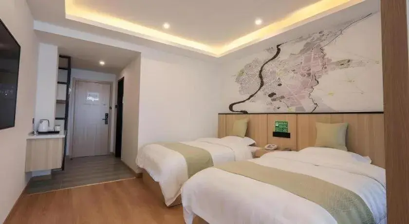 Bed in Vatica Hotel Huangshan South Gate Terminal Station Bed in Vatica Hotel Huangshan South Gate Terminal Station