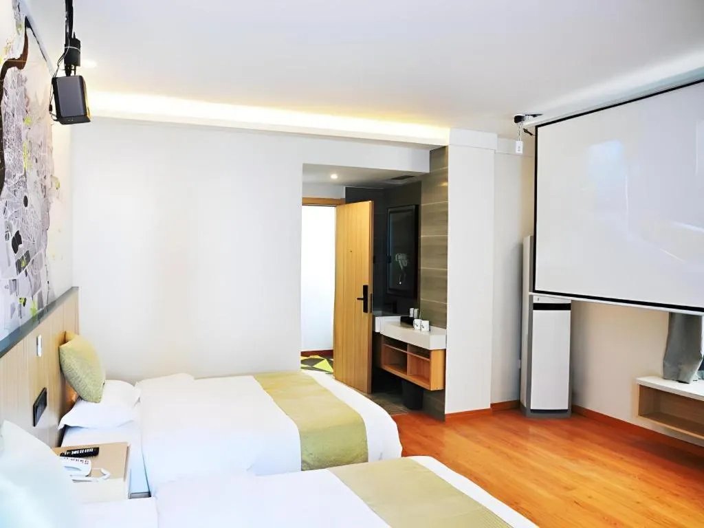 Bed in Vatica Hotel Huangshan South Gate Terminal Station