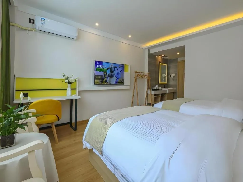 Bed in Vatica Hotel Huangshan South Gate Terminal Station