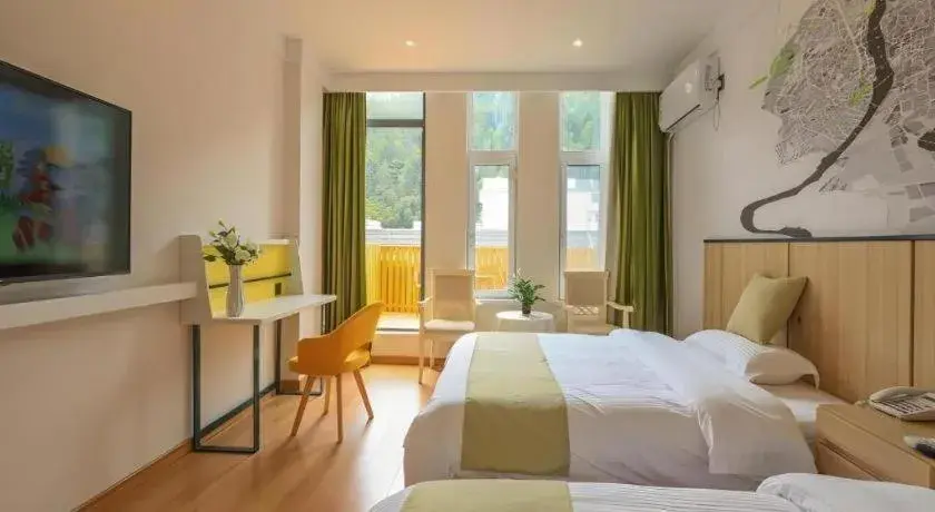 Bed in Vatica Hotel Huangshan South Gate Terminal Station Bed in Vatica Hotel Huangshan South Gate Terminal Station