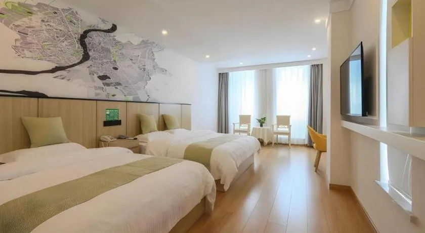 Bed in Vatica Hotel Huangshan South Gate Terminal Station