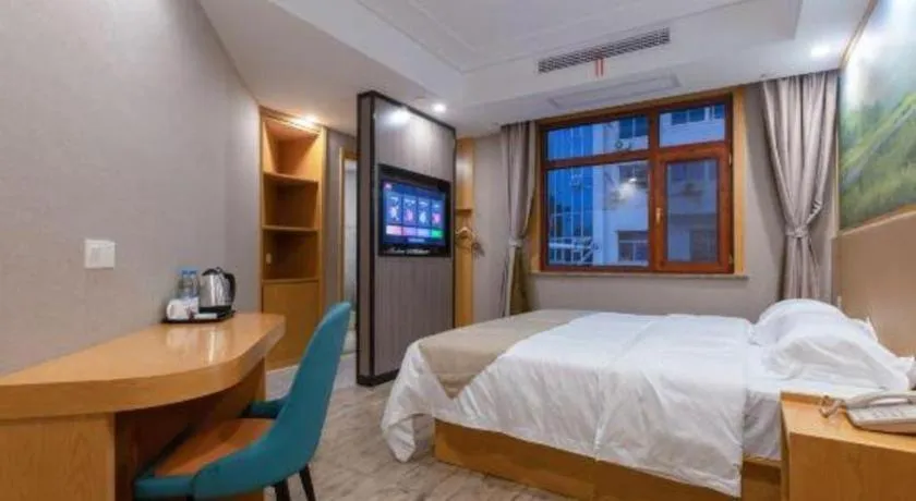 Bed in Shell Hotel Changzhou North Railway Station Global Harbor Metro Station