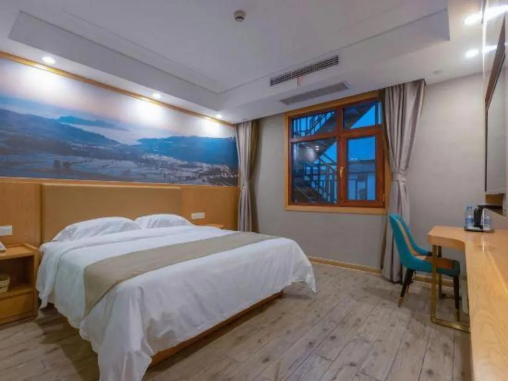 Bed in Shell Hotel Changzhou North Railway Station Global Harbor Metro Station