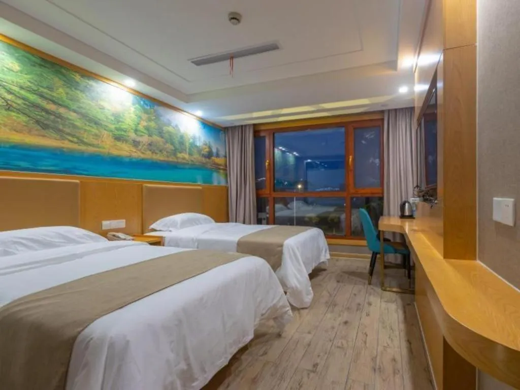 Bed in Shell Hotel Changzhou North Railway Station Global Harbor Metro Station