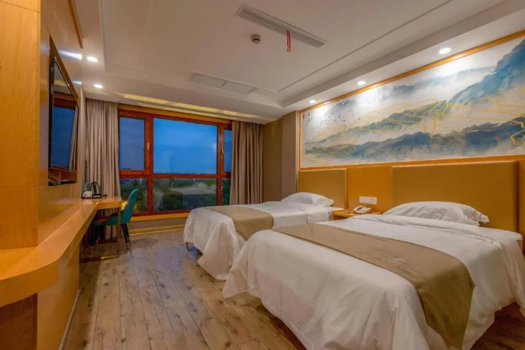 Bed in Shell Hotel Changzhou North Railway Station Global Harbor Metro Station