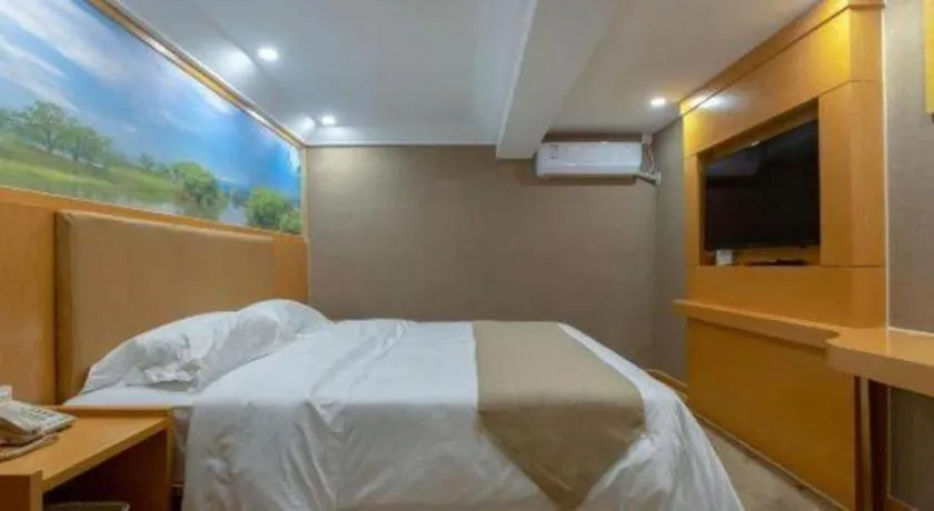 Bed in Shell Hotel Changzhou North Railway Station Global Harbor Metro Station