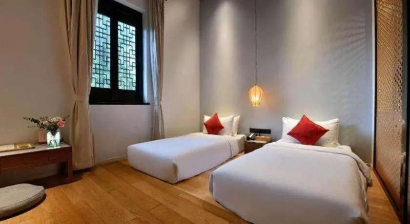 Bed in Blossom House Nanxun Qiushu Lane