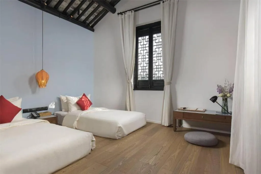 Bed in Blossom House Nanxun Qiushu Lane