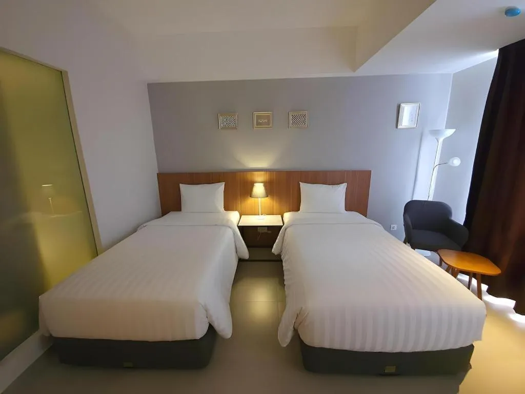Bed in Hart Hotel Premium Rapatmaja