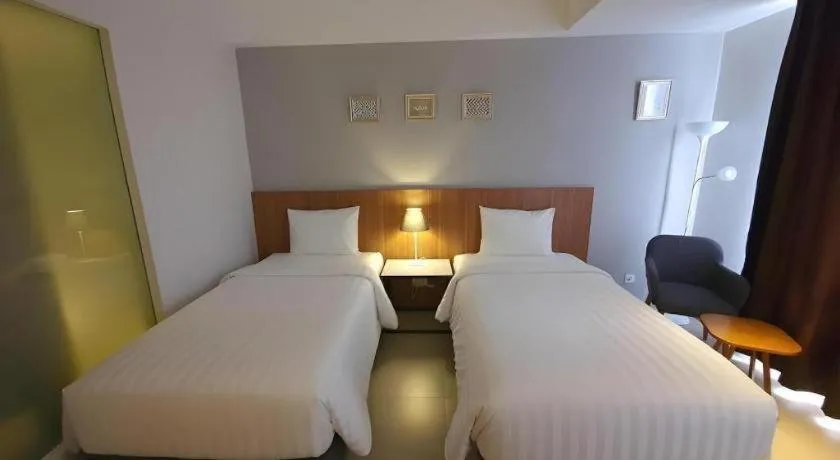Bed in Hart Hotel Premium Rapatmaja