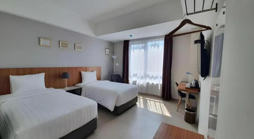 Bed in Hart Hotel Premium Rapatmaja