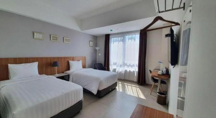 Bed in Hart Hotel Premium Rapatmaja