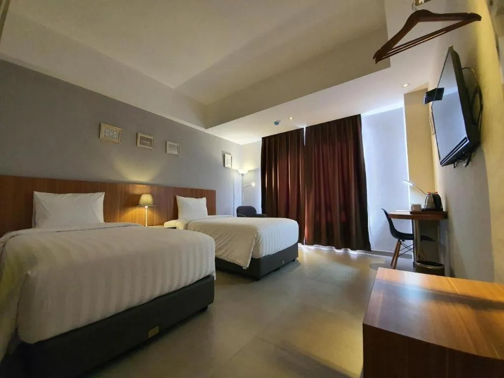 Bed in Hart Hotel Premium Rapatmaja