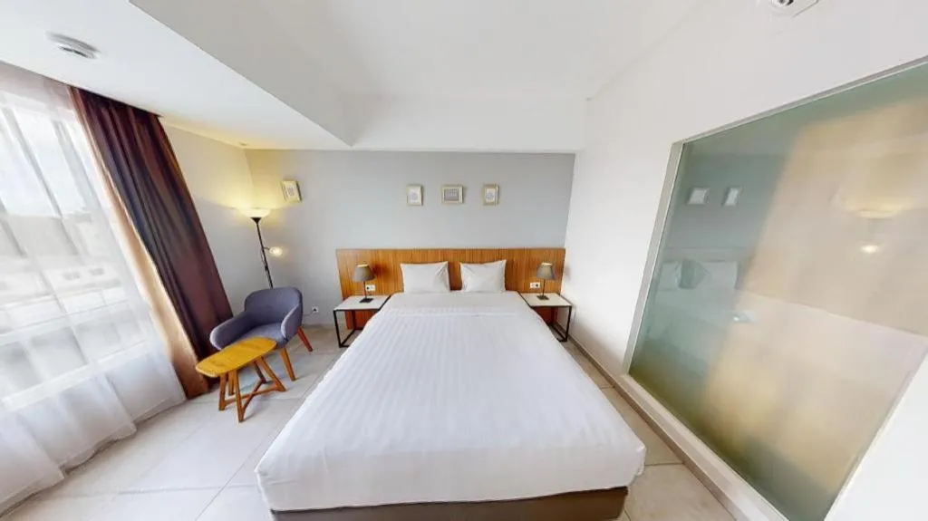 Bed in Hart Hotel Premium Rapatmaja
