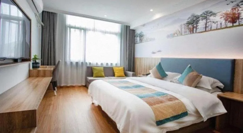 Bed in VX Hotel Hangzhou Banshan